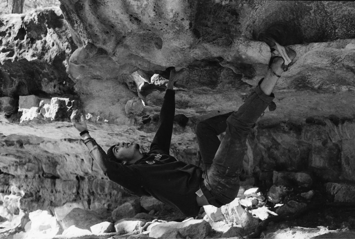 Climber on boulder route called The Fin